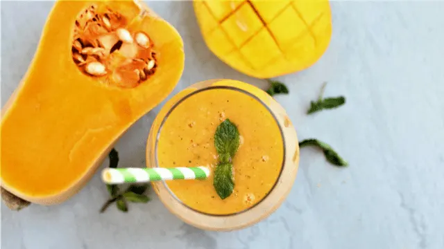 A Vegan Tropical Butternut Squash Smoothie loaded with fruits and vegetables yes, please!!! Healthy.Immune Boosting. Low-Fat.  Vegan. Gluten-Free. Dairy -Free. Nut-Free. Sugar-Free. Delicious. Kid-friendly. Less than 100 calories per serving.