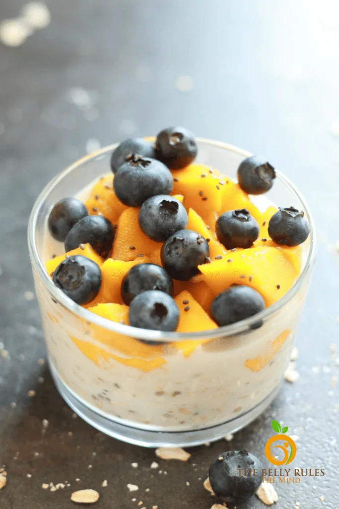 Vegan Overnight Oats with Mango & Blueberries - The Belly Rules The Mind