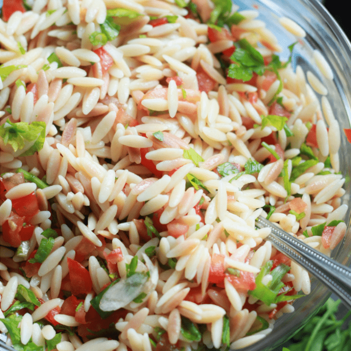 cold orzo pasta salad in a bowl