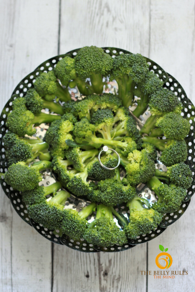 broccoli in a steamer basket