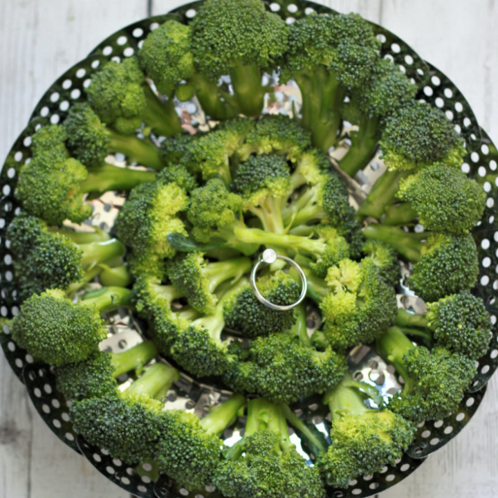broccoli in a steamer basket