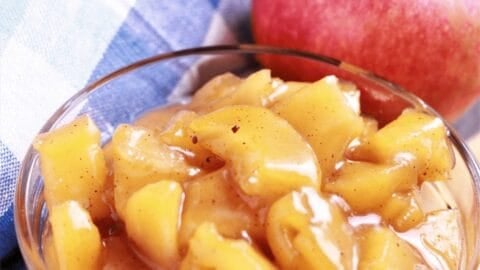 Making homemade Cinnamon Apple Pie filling recipe from scratch, is easier than you think and is so much better than any store bought pie filling. It's made with fresh apples, makes a perfect topping over breakfasts or desserts and bonus, is freezer friendly!!! #applepiefilling #applepiefillingrecipe #homemadeapplepiefilling #instantpotapplepiefilling #cinnamonapples #instantpotcinnamonapples #cinnamonapplepiefillingrecipe #instantpotapplepiefilling #applerecipe #instantpotapplerecipe #pressurecookerapplepiefilling #pressurecookercinnamonapples