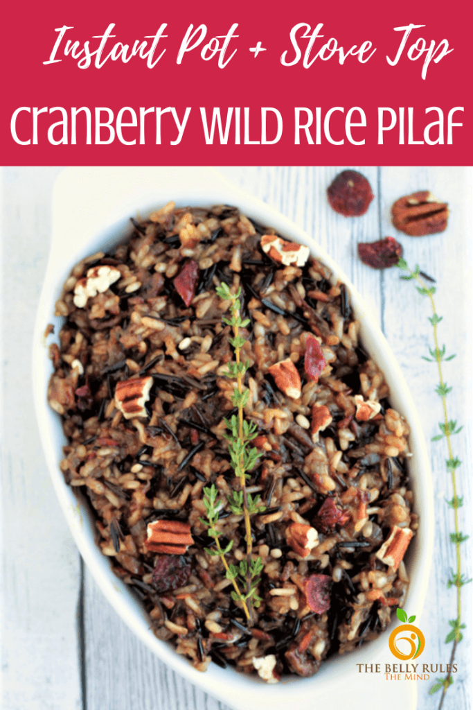 Instant Pot Wild Rice Pilaf, a delicious winter pilaf made with wild rice, cranberries, nuts cooked in herbs, broth and apple juice. A perfect dish infused with so many flavors and textures to go with any meal.  A satisfying rice dish for the winter. Healthy. Vegan. Gluten-Free. Video Recipe.  #wildricepilaf