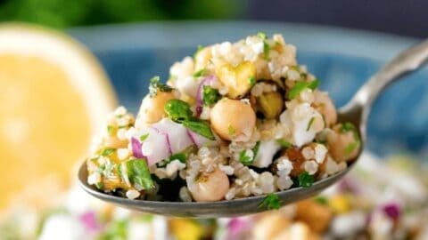 Viral Jennifer Aniston Salad recipe with chickpeas, feta, and herbs, perfect for healthy eating and.