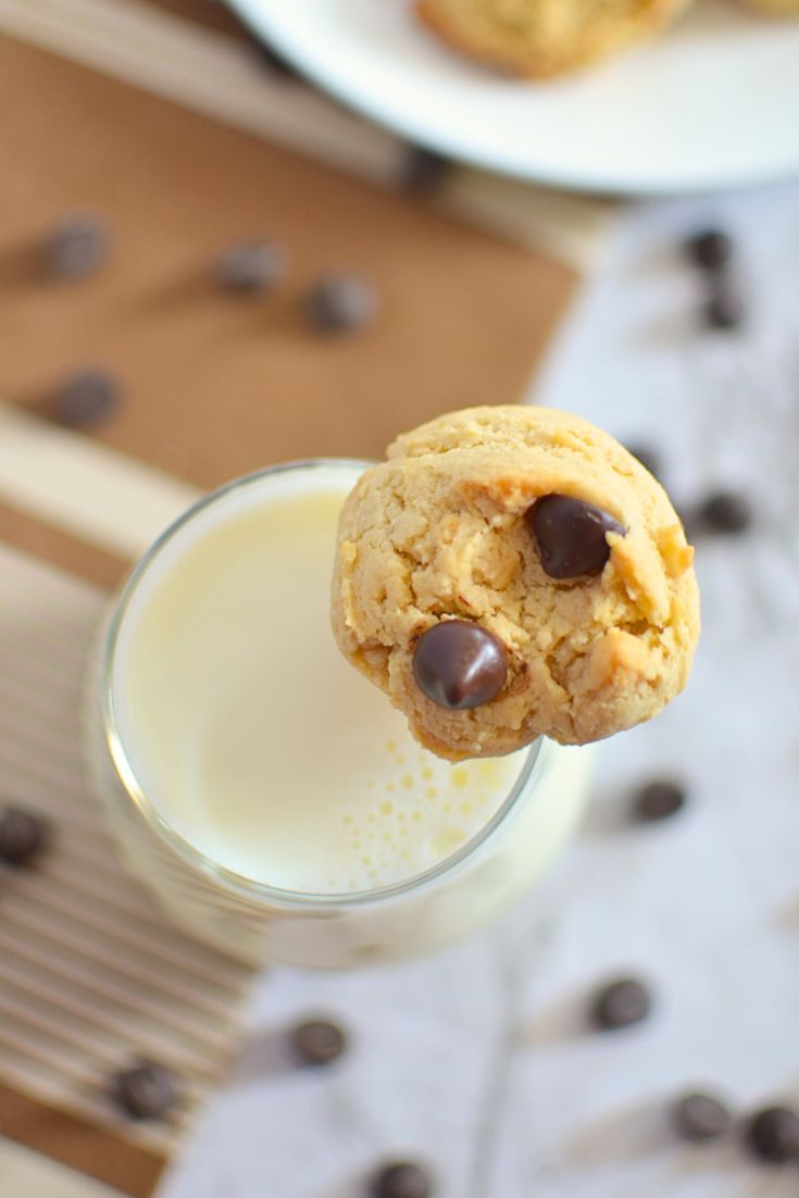 shows how to serve cream cheese cookies with a glass of milk.