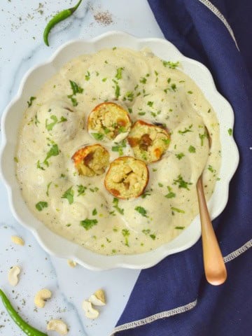 Stuffed Malai kofta made in silky white gravy