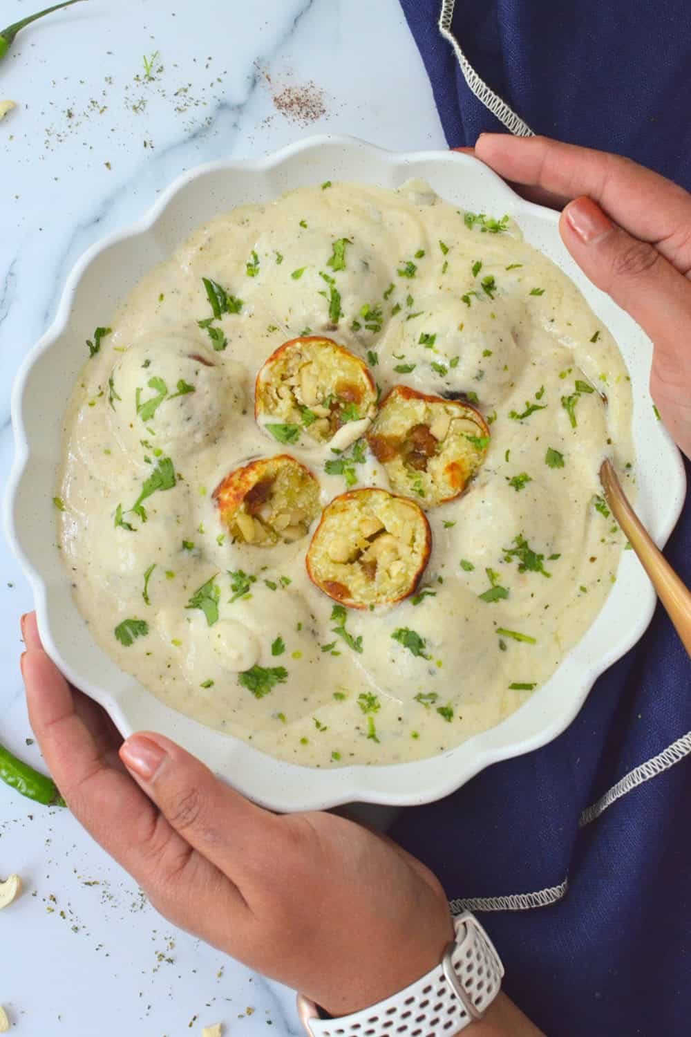 Stuffed Malai kofta made in silky white gravy