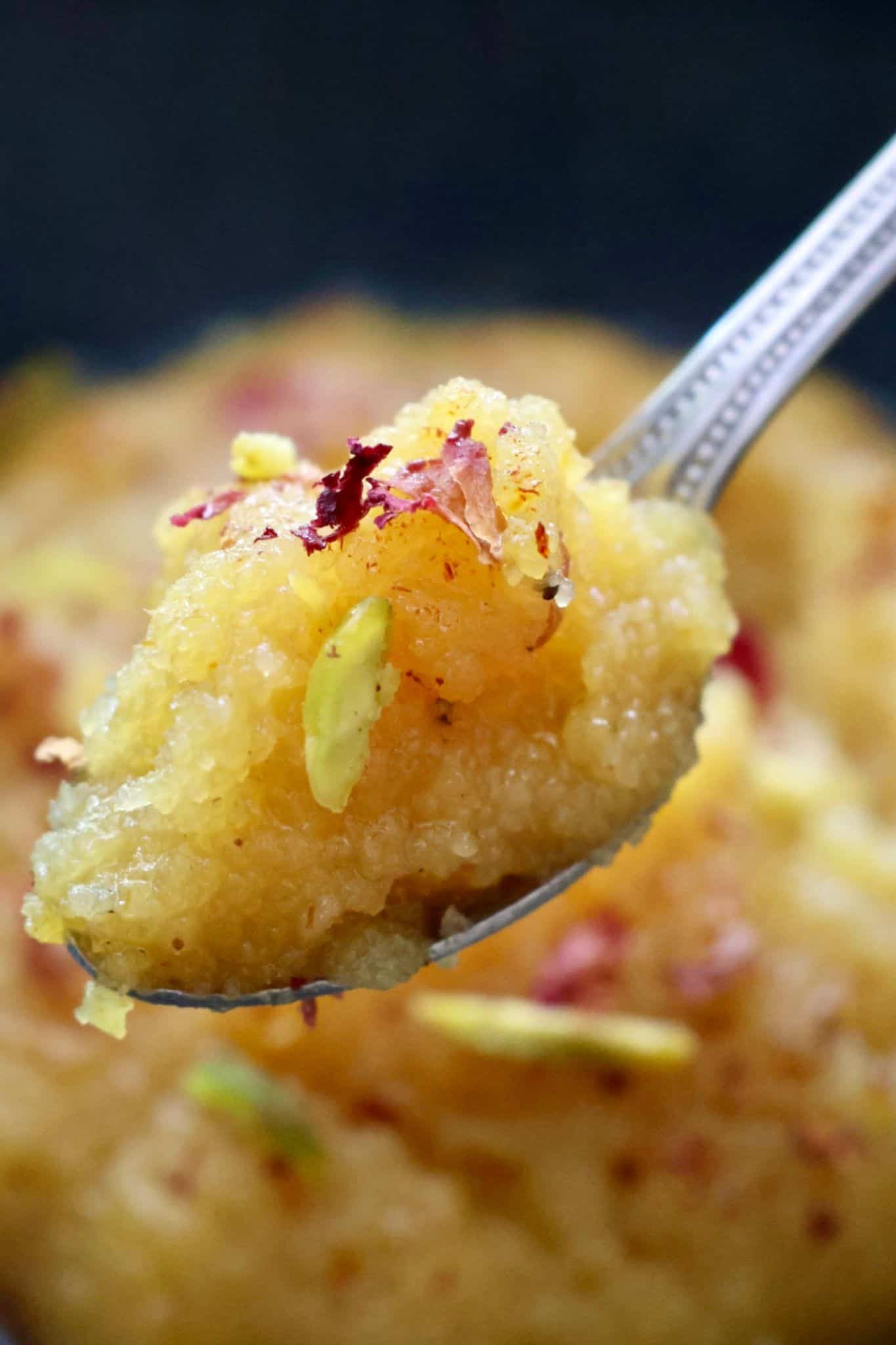badam halwa in a spoon