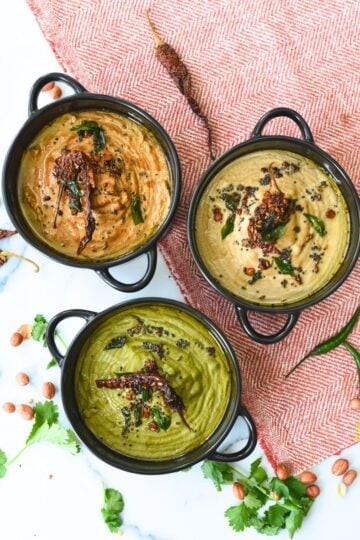 Delicious vegetable rava appe served in traditional black pots. Perfect for healthy snacks and flavo.