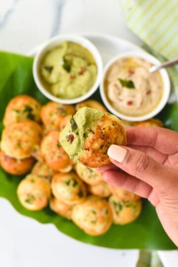 Delicious vegetable rava appe with chutneys for healthy snacking.