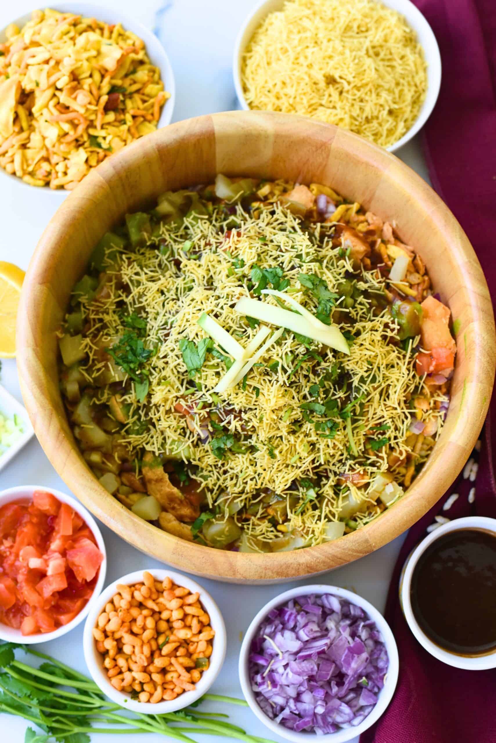 Delicious Bhel Puri with crunchy sev, fresh vegetables, and tangy tamarind chutney. Perfect for a fl.
